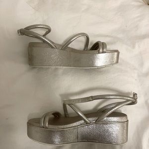 J Slides silver platform shoes